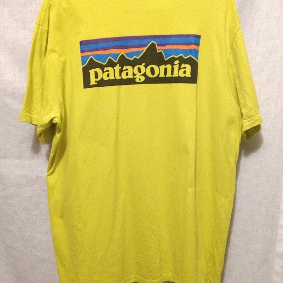 Patagonia Other - Patagonia Yellow Graphic Breast Pocket LOGO shirt